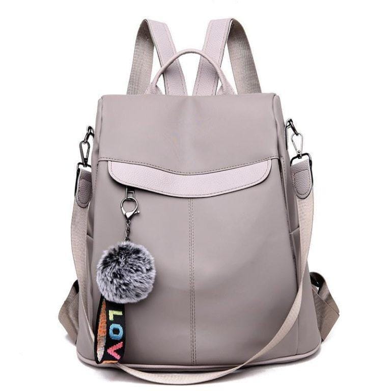 Mochila Oxford impermeable para mujer, Bolsa Escolar con bola de pelo para adolescentes, Mochila de viaje de gran capacidad | Miravia