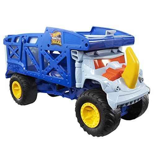 41% DESCUENTO Hot Wheels Monster Trucks Rino Camión de Transporte de Coches de Juguete con Pista, Regalo para niños y niñas +3 años (Mattel HFB13)