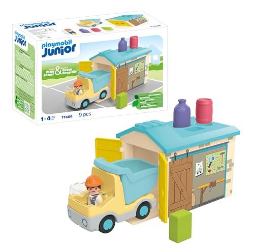 60% DESCUENTO PLAYMOBIL Junior 71686 Camión de Obras con Garaje, Incluye Caja basculante móvil y Garaje, Juguete sostenible Hecho de plásticos a Base de Plantas, Juguetes para niños y niñas a Partir de 1 año